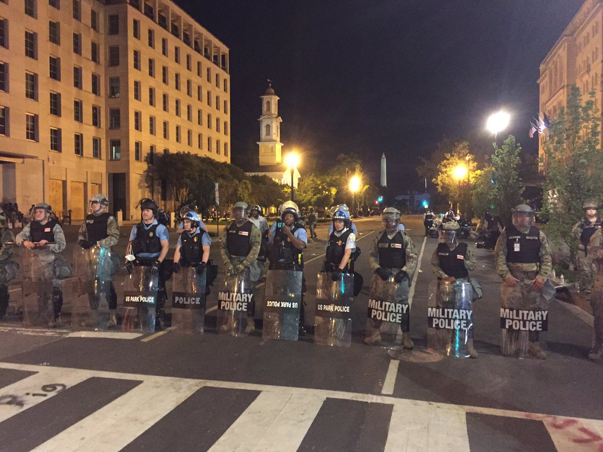 Military Police with riot shields holding entrances past Farragut