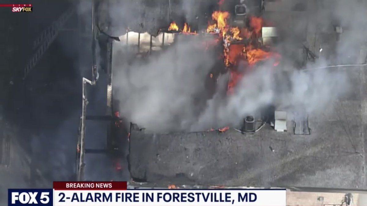 2-Alarm fire spreading through 4 story garden apartment complex in Forestville Maryland. FOX5DC crew on the way to the scene