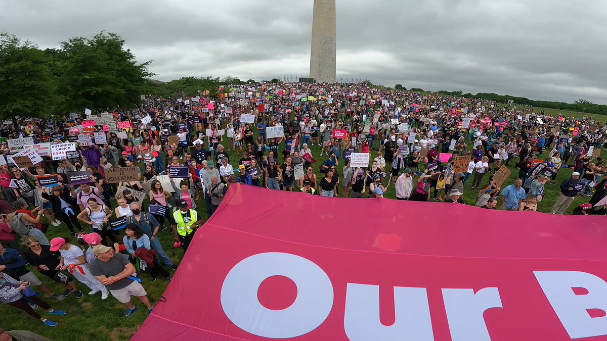 The National Mall, where thousands of abortion rights supporters are rallying before a march down Constitution Avenue and onto Capitol Hill. A Women's March organizer calls it day one of a summer of rage, leading the crowd in chants of ungovernable