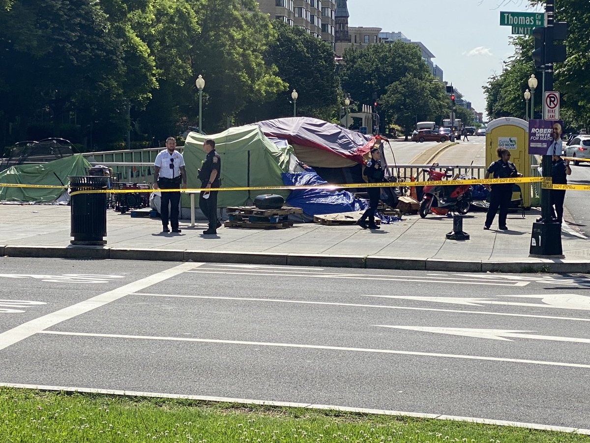 DC Police are on scene of a report of a shooting at a homeless encampment in Thomas Circle. Officers are waiting for crime scene units to respond