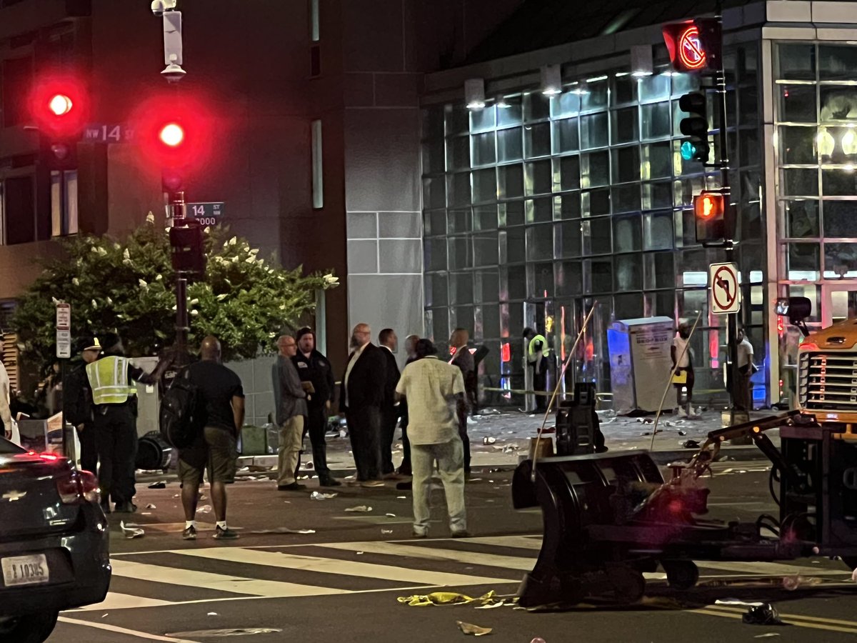 DC police going over the scene of the shooting on U Street