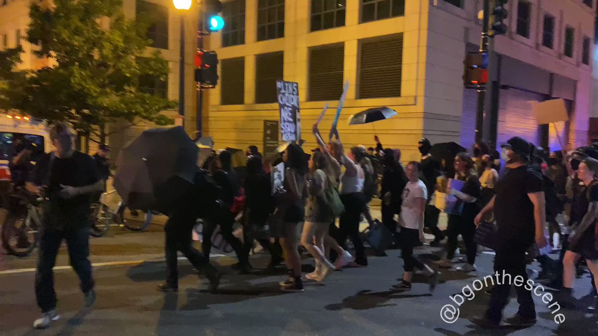 Police attempt to stop the crowd from advancing towards the Supreme Court, protesters push past and make their way along 3rd Street