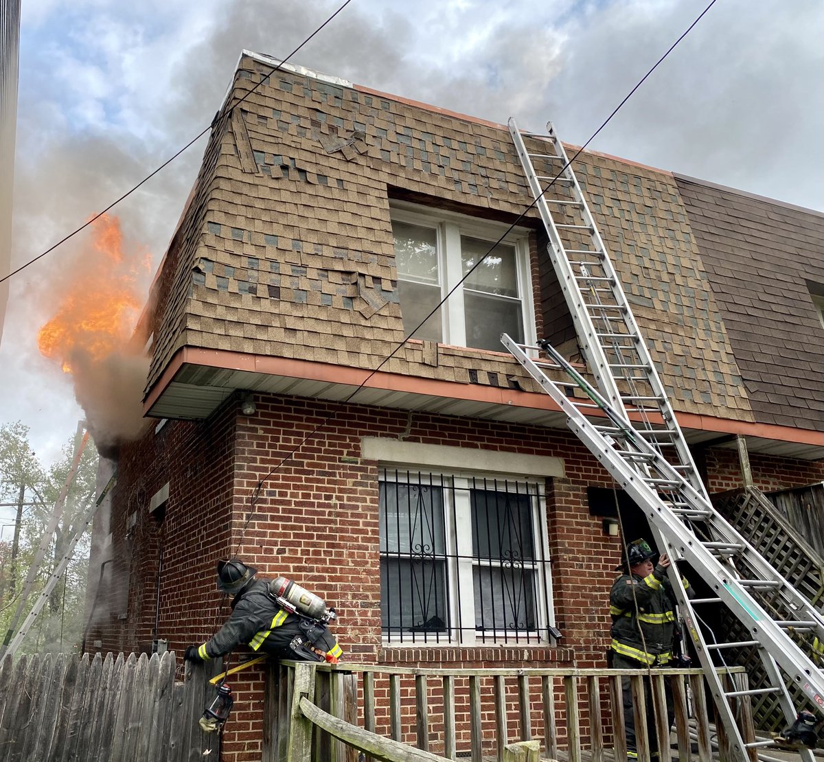 Fire 3300 block Croffut Pl. SE. Fire top floor 2 story occupied end row dwelling. Fire knocked down and under control. Residents safely evacuated prior to arrival. No injuries reported. 2 adults & 11 children displaced. Investigators on scene to determine cause