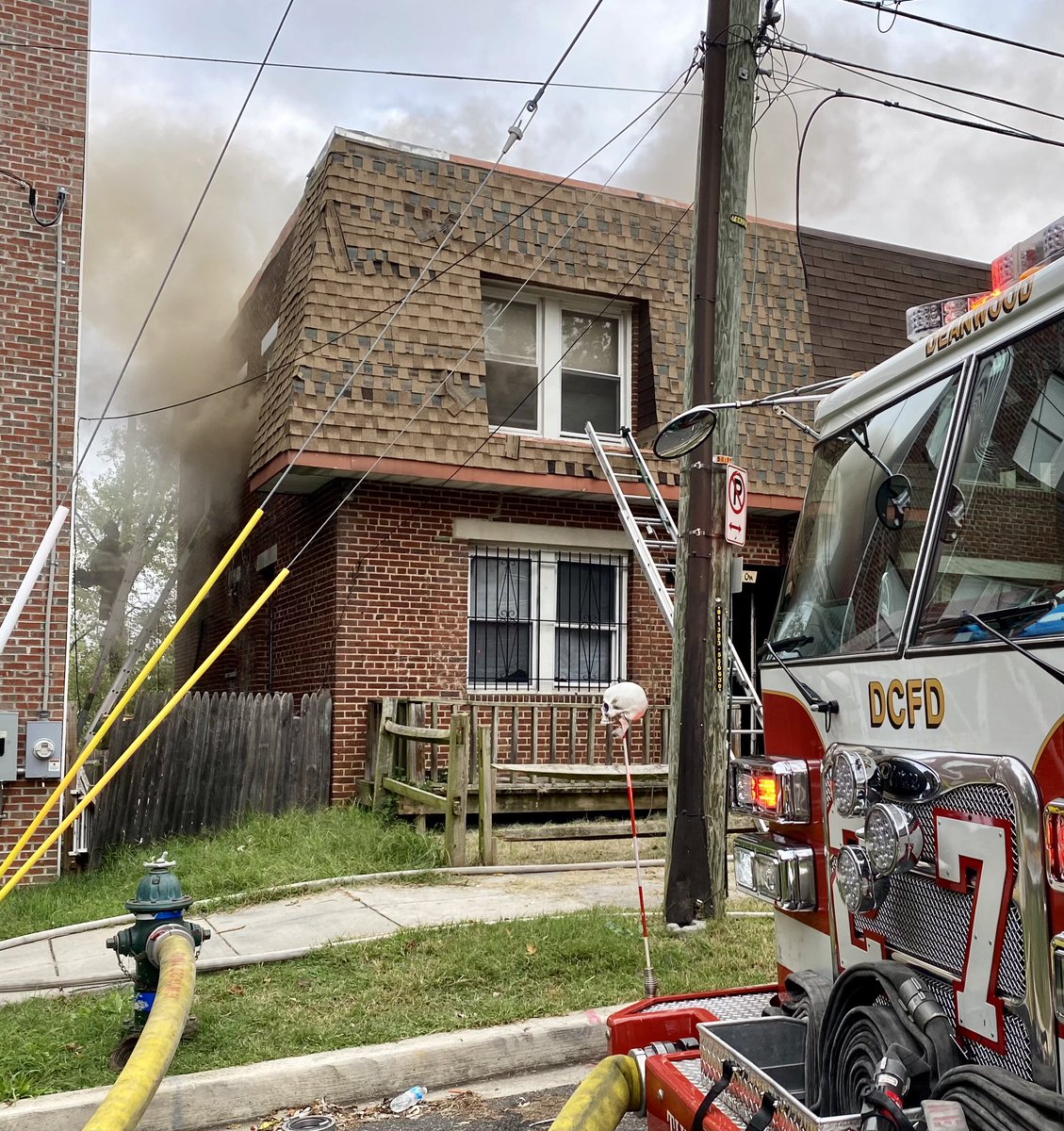 Fire 3300 block Croffut Pl. SE. Fire top floor 2 story occupied end row dwelling. Fire knocked down and under control. Residents safely evacuated prior to arrival. No injuries reported. 2 adults & 11 children displaced. Investigators on scene to determine cause