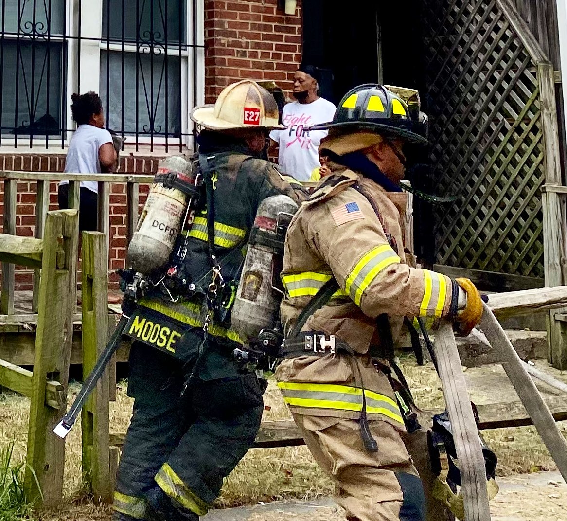 Fire 3300 block Croffut Pl. SE. Fire top floor 2 story occupied end row dwelling. Fire knocked down and under control. Residents safely evacuated prior to arrival. No injuries reported. 2 adults & 11 children displaced. Investigators on scene to determine cause