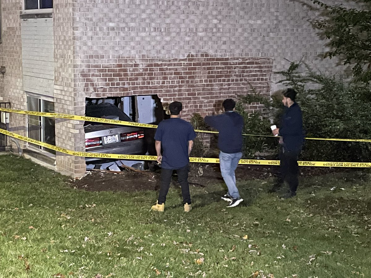 Car into apartment building on Clermont St NE.  Driver of vehicle not found