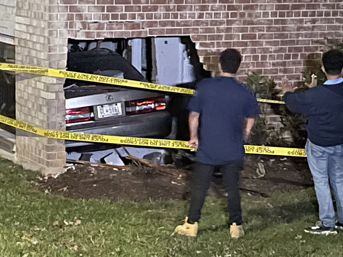 Car into apartment building on Clermont St NE.  Driver of vehicle not found