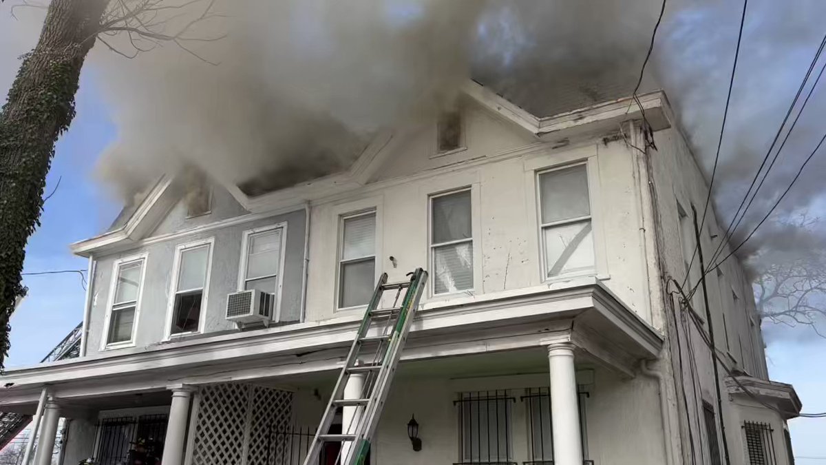 Working Fire 1300 block V St SE. Fire in attic 2 frame attached homes. Interior attack in progress. DC firefighters