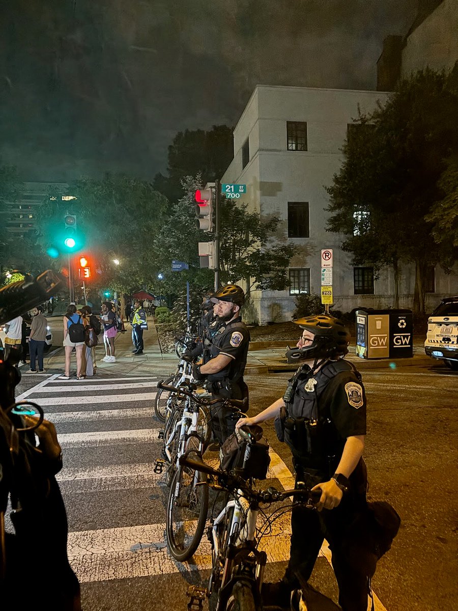 GW PRO-PALESTINE ENCAMPMENT GETS RAIDED. These are the people who have cleared out from U Yard.  gathering at 21st and H Sts NW. MPD (assisted by other agencies) is moving in on the Pro-Palestine protesters at George Washington University in Washington, D.C. 