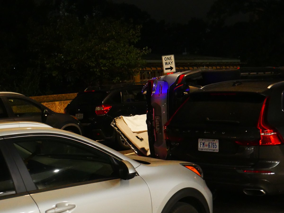 Meridian Hill Park, 2400 block of 15th Street NW in ColumbiaHeightsDC— the driver was briefly trapped but was extricated & taken to a hospital. Looks like police are still looking for a passenger or a gun