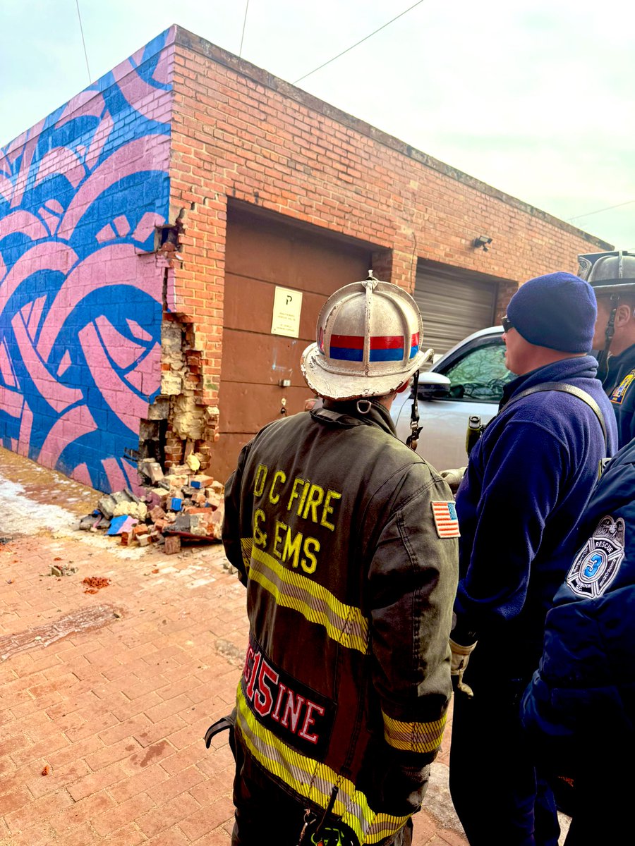 Vehicle struck building alley rear 500 block 9th St SE. Structure involved is 1 story unoccupied garage. No injuries. Cave-in Task Force conducting structural assessment. Establishing a safety perimeter 