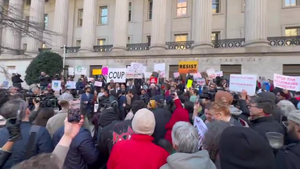 Chants of Hey Hey Ho Ho Elon Musk has got to go outside Treasury.   I'd estimate a few hundred people, plus maybe two dozen Dem lawmakers, are here