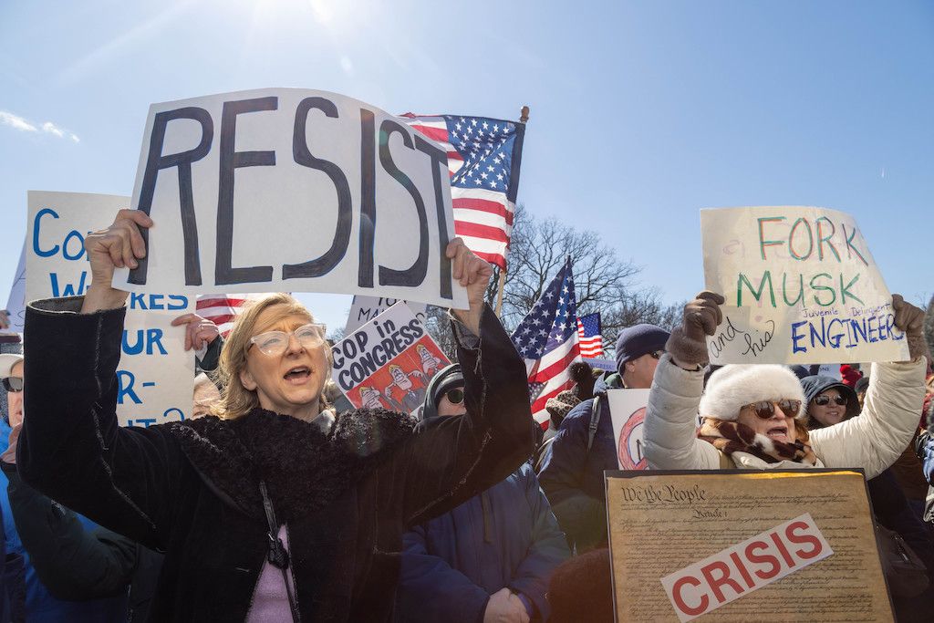 Around 3,000 people gathered at the US Capitol Reflecting Pool in DC on Monday to protest the deep cuts President Trump and Elon Musk are making to the federal government