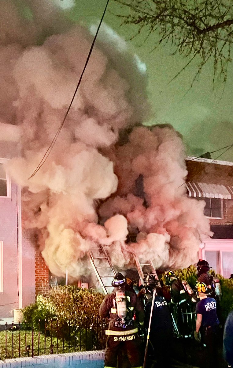 2 Alarm fire 2200 block 16th St NE. Visible fire all levels knocked down. Working on hotspots. Continue to operate with extreme caution due to compromised 1st floor. Also encountered clutter conditions. Images here show early conditions. DC firefighters