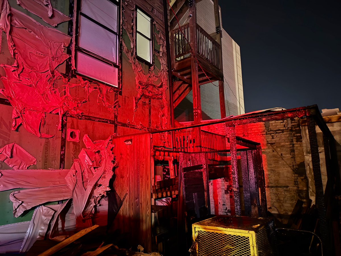 Box Alarm rear 3900 block 14th St NW. Fire involved  storage area and exterior wall of 3 story structure. Fire under control with no injuries. Investigators on scene. DC firefighters