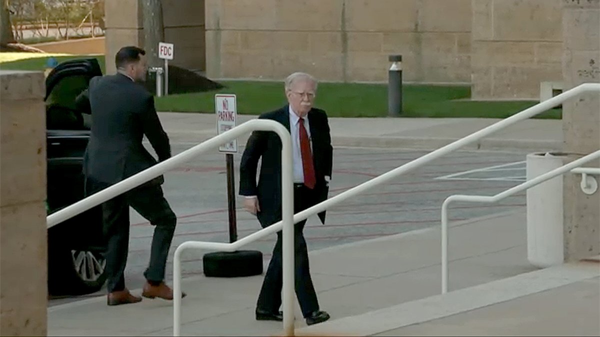 Former National Security Advisor John Bolton surrenders to face charges of sharing classified information