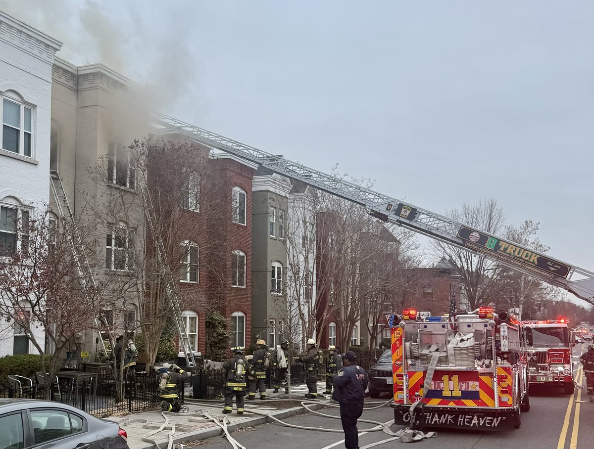 Now 2 Alarm Fire 2100 block 13th St NW. Had fire in attic thru roof 3 story attached row with fire threatening both adjacent homes. Bulk of fire knocked down via aggressive interior operations. DC firefighters