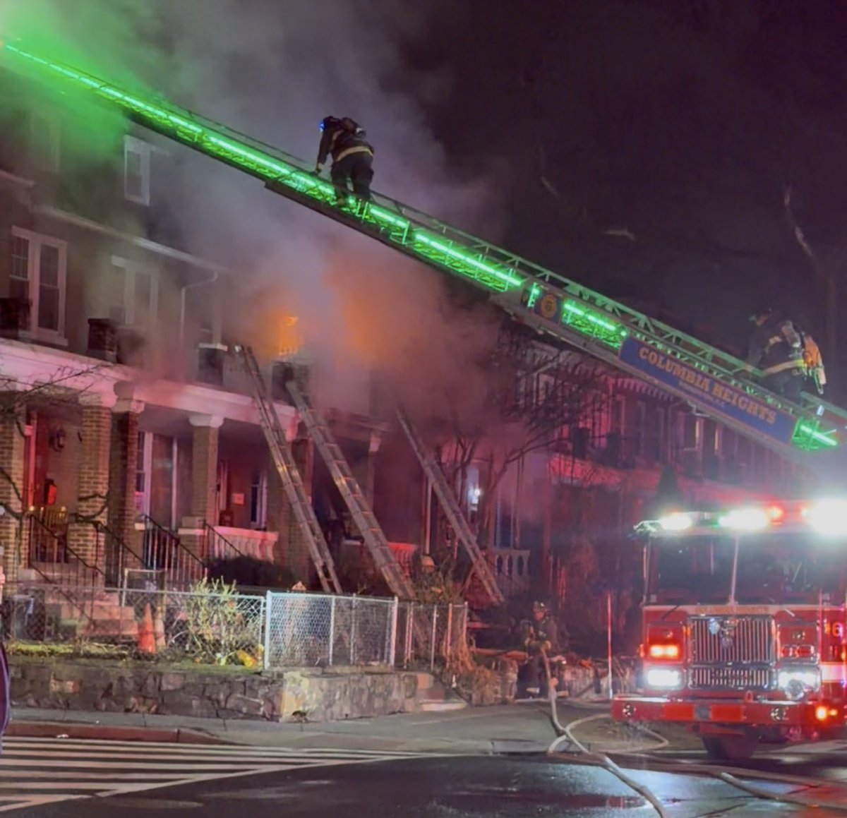 Fire Task Force 3800 block Kansas Ave NW. Fire under control. Firefighters prevented spread into attached adjacent homes. 1 civilian evaluated by EMS needed no further treatment. 1 firefighter transported minor injuries. 2 additional trucks requested. 9 displacements