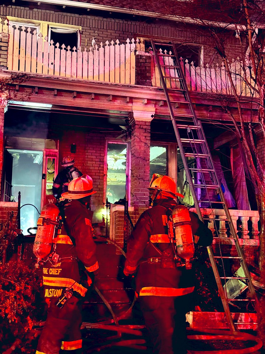Fire Task Force 3800 block Kansas Ave NW. Fire under control. Firefighters prevented spread into attached adjacent homes. 1 civilian evaluated by EMS needed no further treatment. 1 firefighter transported minor injuries. 2 additional trucks requested. 9 displacements
