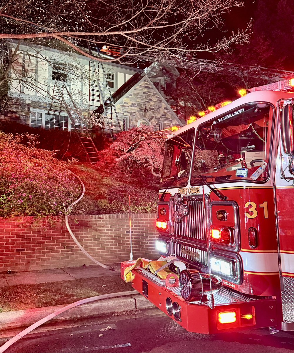 Box Alarm 4500 block 28th St NW. Fire confined to a portion of attic on large 2 story occupied detached house. Fire under control with no injuries. Request air unit & . Dispatched at 10:06 PM. DC firefighters