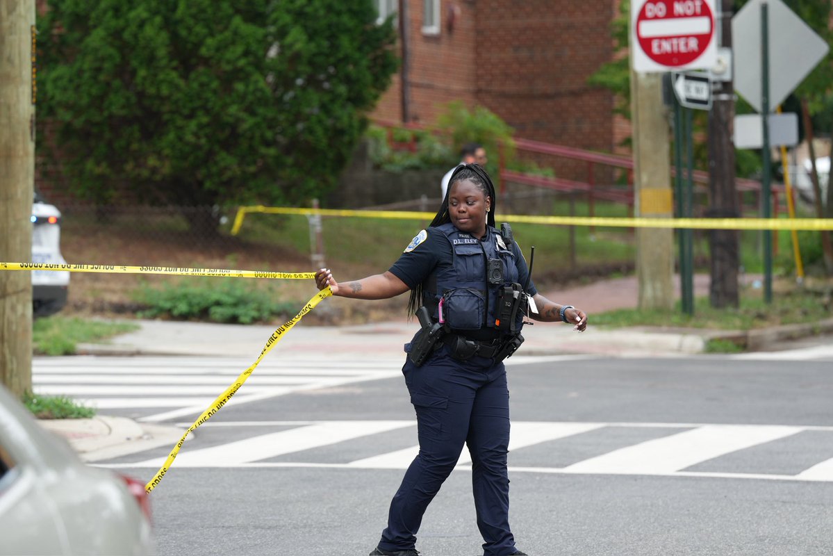 DC police on scene of a homicide at 16th and Marion Barry SE